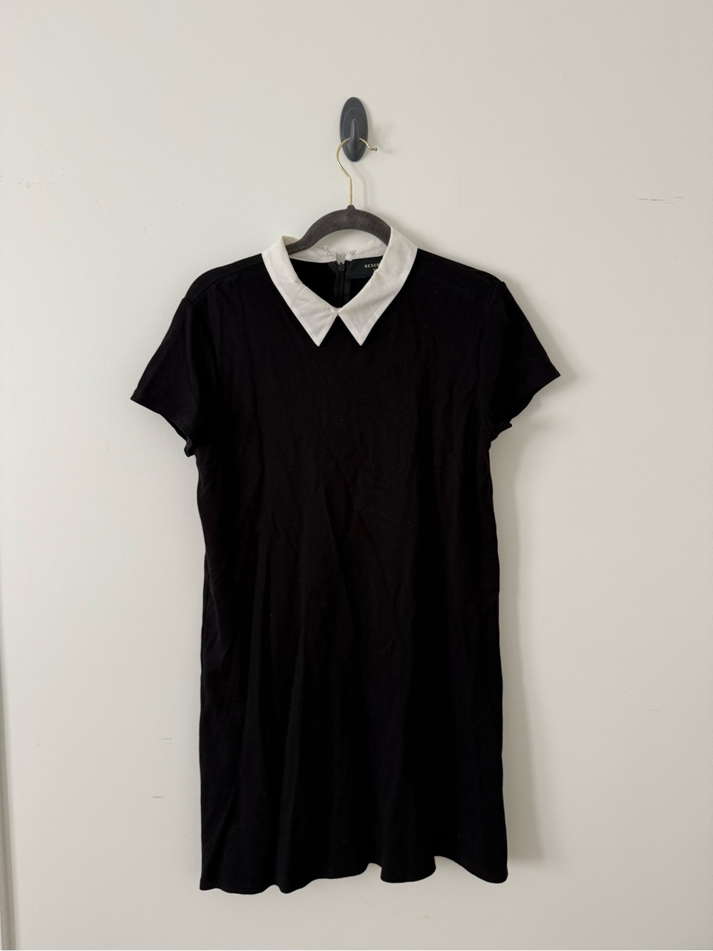 Reserved Black Dress with White Collar Accent